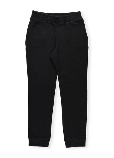 Shop Balmain Kids Logo Embossed Sweatpants In Black