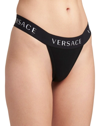 Shop Versace Logo Band Thong In Nero