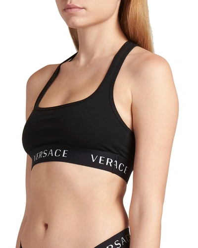 Shop Versace Logo Band Racerback Sports Bra In Nero