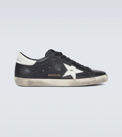 Shop Golden Goose Super-star Leather Sneakers In Black/white