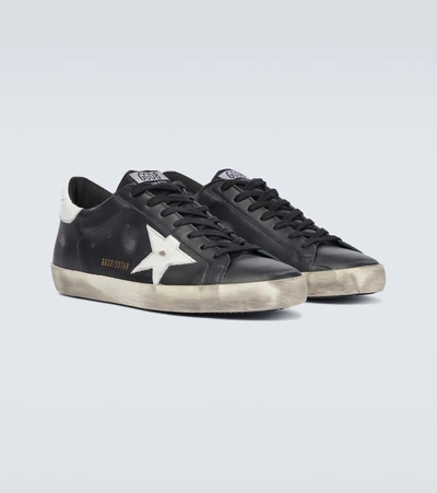 Shop Golden Goose Super-star Leather Sneakers In Black/white