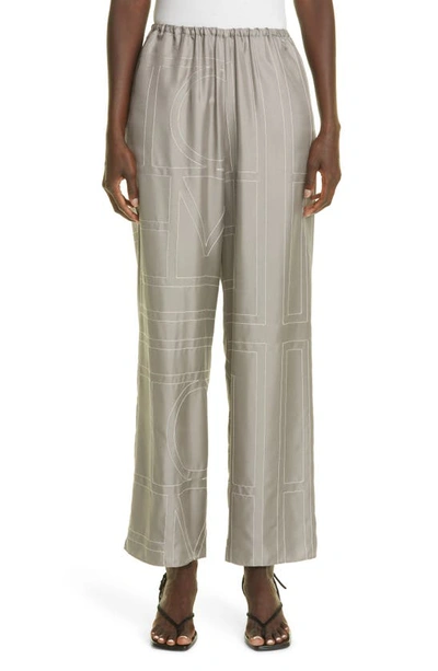 Shop Totême Monogram Silk Pajama Bottoms In Skyscraper