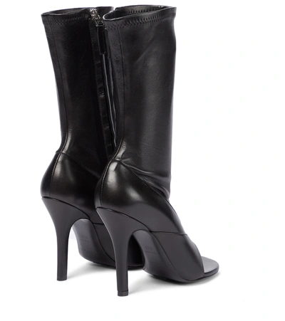 Shop Givenchy Leather Thong Mid-calf Boots In Black