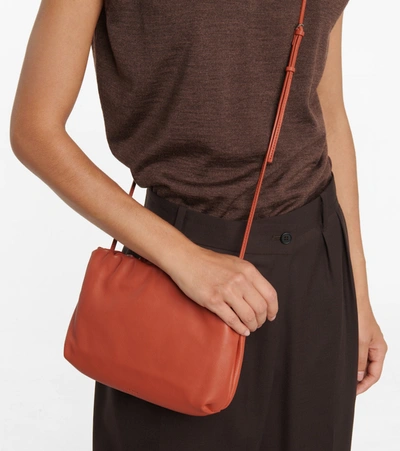 Shop The Row Bourse Leather Clutch In Brown