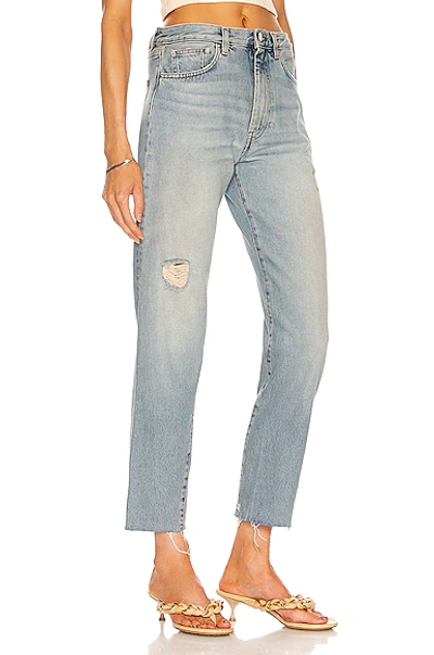 Shop Totême Twisted Seam Denim In Distressed Light Blue