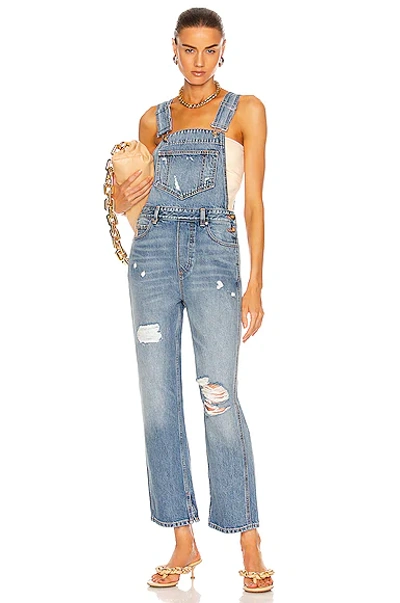 Shop Ganni Overwashed Denim Overalls