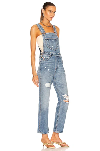 Shop Ganni Overwashed Denim Overalls