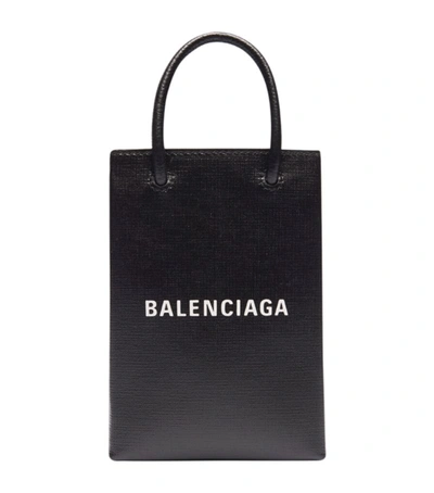 Shop Balenciaga Leather Shopping Phone Holder In Black