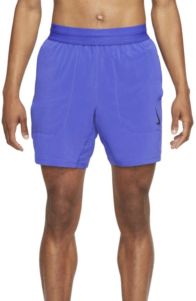 Shop Nike Dri-fit Flex Pocket Yoga Shorts In Lapis/ Black