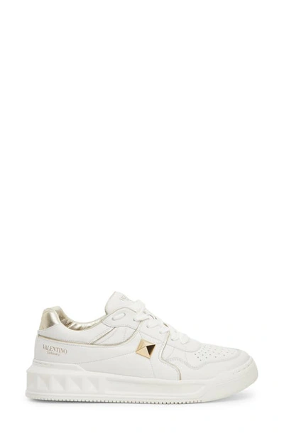Shop Valentino Roman Stud Low Top Sneaker In Bianco