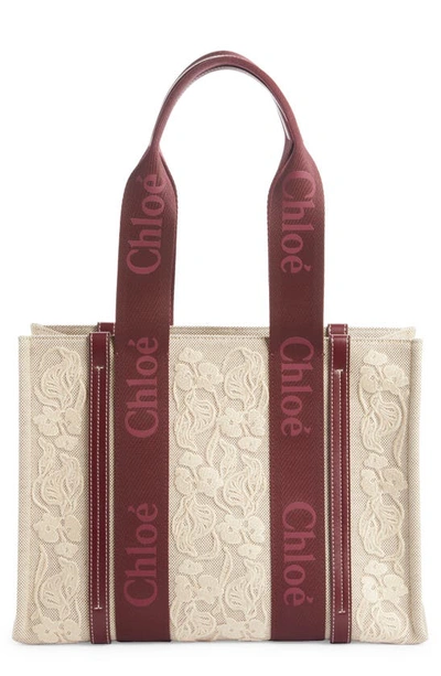 Shop Chloé Medium Woody Embroidered Canvas Tote In Burgundy
