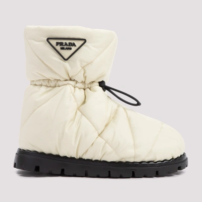 Shop Prada Triangle Logo Padded Boots In White