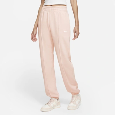 Shop Nike Sportswear Essential Collection Women's Fleece Pants In Pale Coral,white