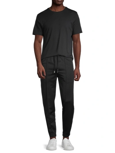 Shop Givenchy Logo Tape Slim Trackpants In Black