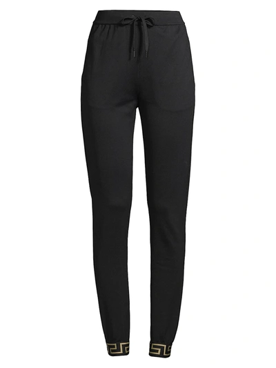 Shop Versace Greca Jogger Pants In Black