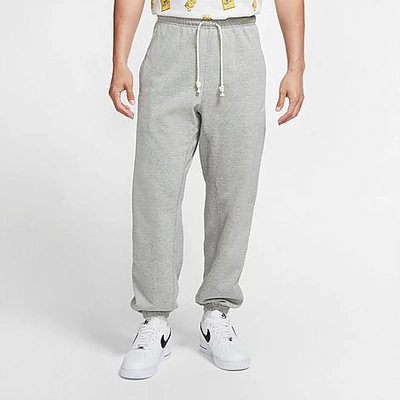 Shop Nike Men's Standard Issue Jogger Pants In Dark Grey Heather/pale Ivory