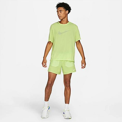 Shop Nike Men's Dri-fit Flex Stride Run Division Brief-lined 5 Running Shorts In Light Lemon Twist