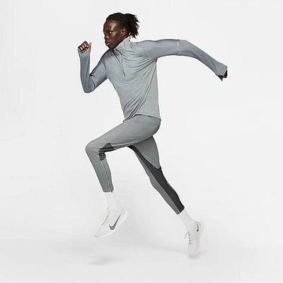 Shop Nike Men's Phenom Elite Knit Running Pants In Light Smoke Grey/smoke Grey/reflective Silver