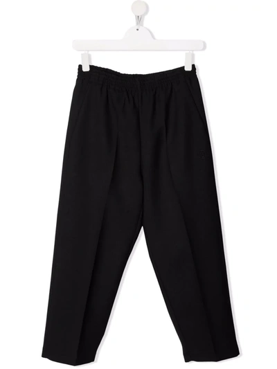 Shop Mm6 Maison Margiela Teen Elasticated Slim-cut Trousers In Black