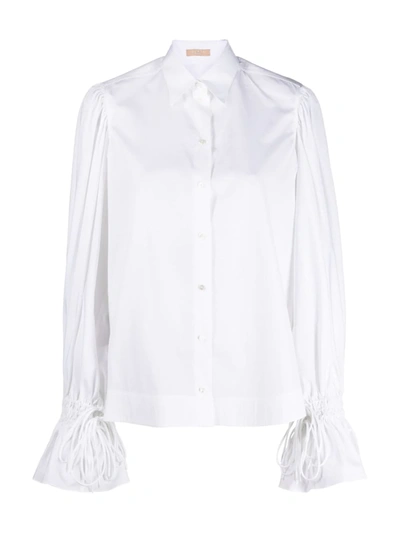Shop Alaïa Flounce-sleeved Cotton Shirt In White