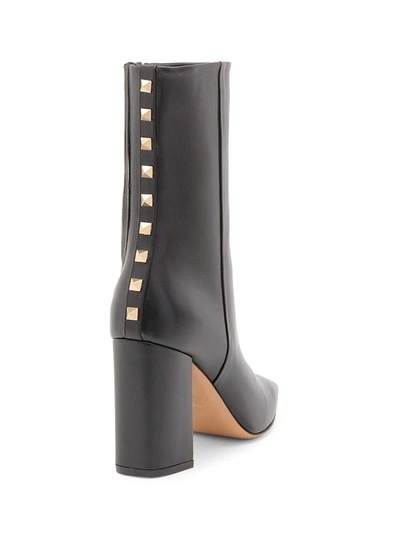 Shop Valentino Rockstud Leather Booties In Nero