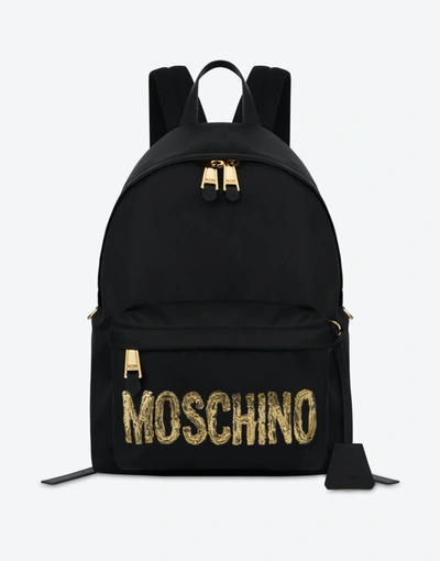 Shop Moschino Painted Logo Nylon Backpack In Black