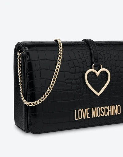 Shop Love Moschino Clutch With Heart Charm In Black