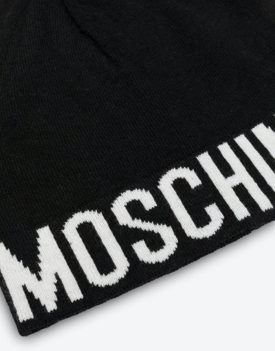 Shop Moschino Wool Blend Hat With Logo. In Beige