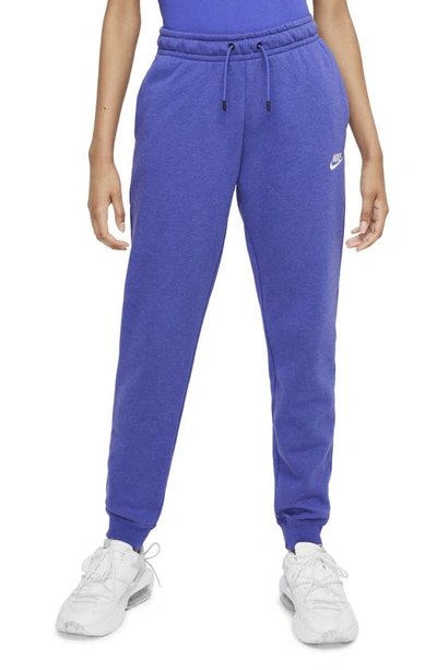 Shop Nike Sportswear Essential Fleece Pants In Lapis/ Heather/ White