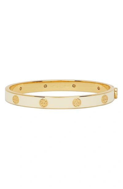 Shop Tory Burch Stud Enamel Bangle Bracelet In Tory Gold / New Ivory