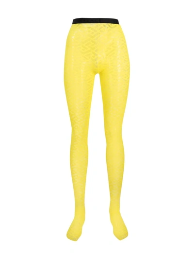 Shop Versace Monogram Tulle Sheer Tights In Yellow