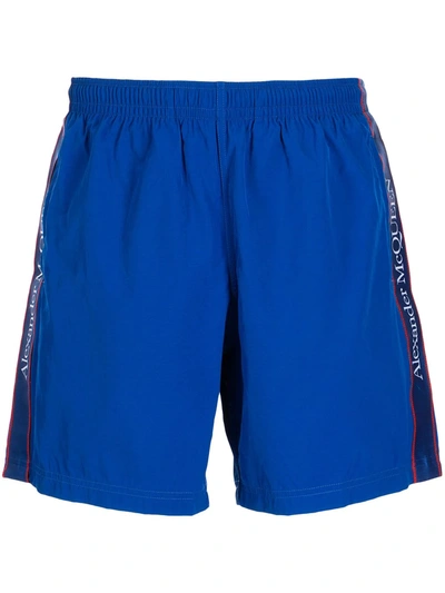 Shop Alexander Mcqueen Logo-tape Slip-on Swim Shorts In Blue
