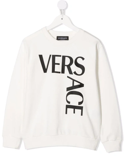 Shop Versace Logo-print Cotton Jumper In Neutrals