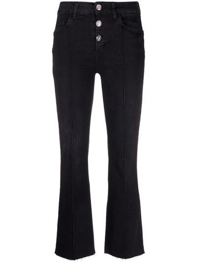 Shop Liu •jo Mid-rise Flared Jeans In Black
