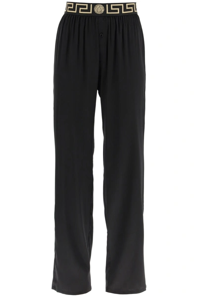 Shop Versace Silk Satin Pajama Trousers With Greca Band In Black (black)