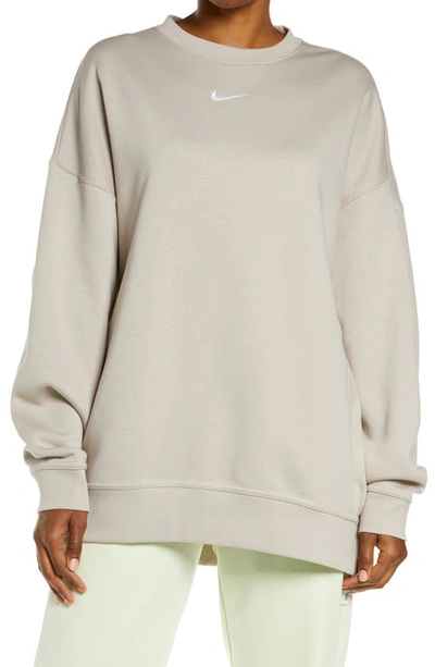Shop Nike Sportswear Collection Essentials Oversize Fleece Crew Sweatshirt In Cream Ii/ White