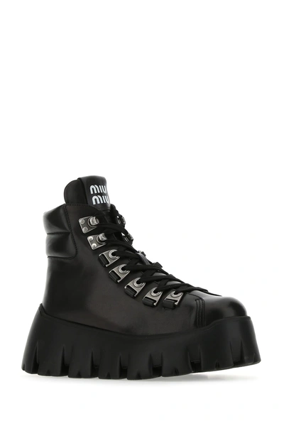 Shop Miu Miu Black Leather Ankle Boots  Black  Donna 40