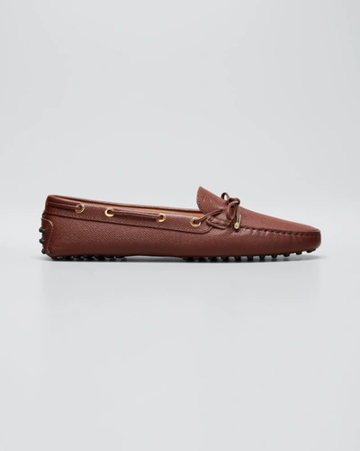 Shop Tod's Laccetto Gommini Driver Loafers In Brown