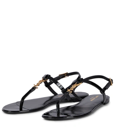 Saint Laurent Black Cassandra Flat Sandals In Crocodile-embossed Leather With Gold-tone Monogram In Black
