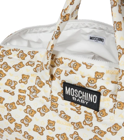 Shop Moschino Baby Printed Stretch-cotton Changing Bag With Mat In 白色