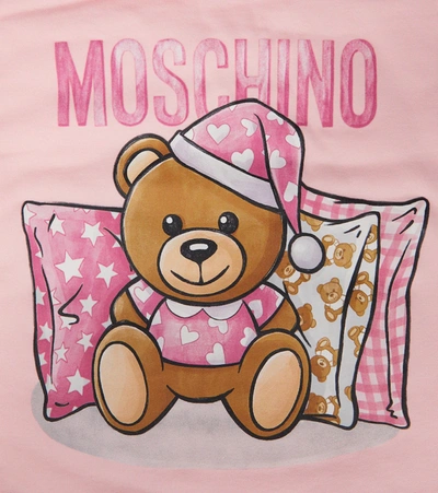Shop Moschino Baby Printed Stretch-cotton Bunting Bag In 粉红色