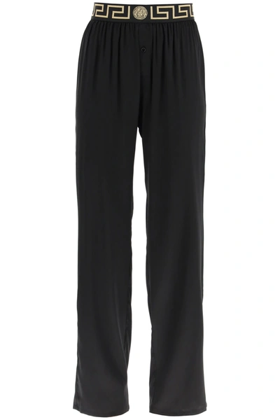 Shop Versace Silk Satin Pajama Trousers With Greca Band In Black,gold