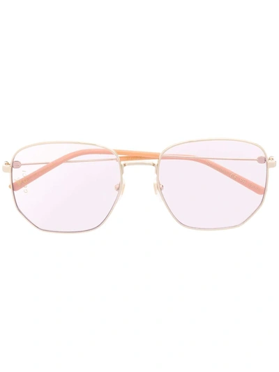 Shop Gucci Geometric-frame Sunglasses In Gold
