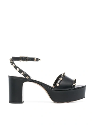 Shop Valentino Rockstud Platform Sandals In Black