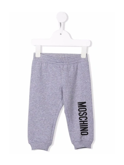 Shop Moschino Logo-print Cotton Track Trousers In Grey