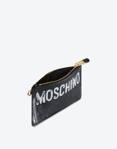Shop Moschino Painted Logo Calfskin Clutch In Black