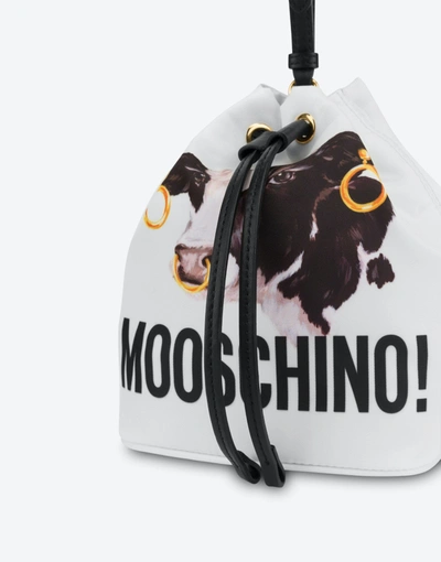 Shop Moschino Cow Bucket Bag In White
