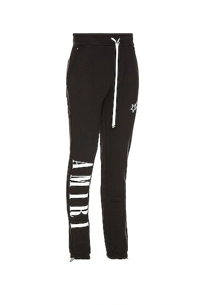 Shop Amiri Vertical Logo Sweatpant In Black