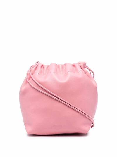 Shop Jil Sander Pink Leather Crossbody Bucket Bag  With Drawstring