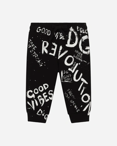 Shop Dolce & Gabbana Junior Kid's Graffiti Jog Pants In N0000 Blackwht